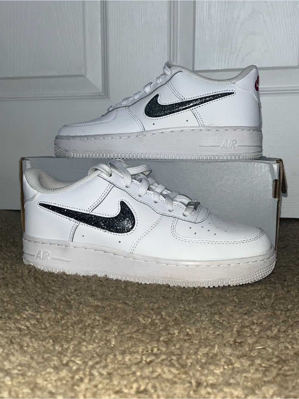 Nike Girls White Air Force 1s with Black Glitter Swoosh